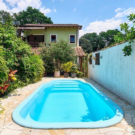 Casa Petúnia com ar e piscina perto do Centro Araquari Exterior foto