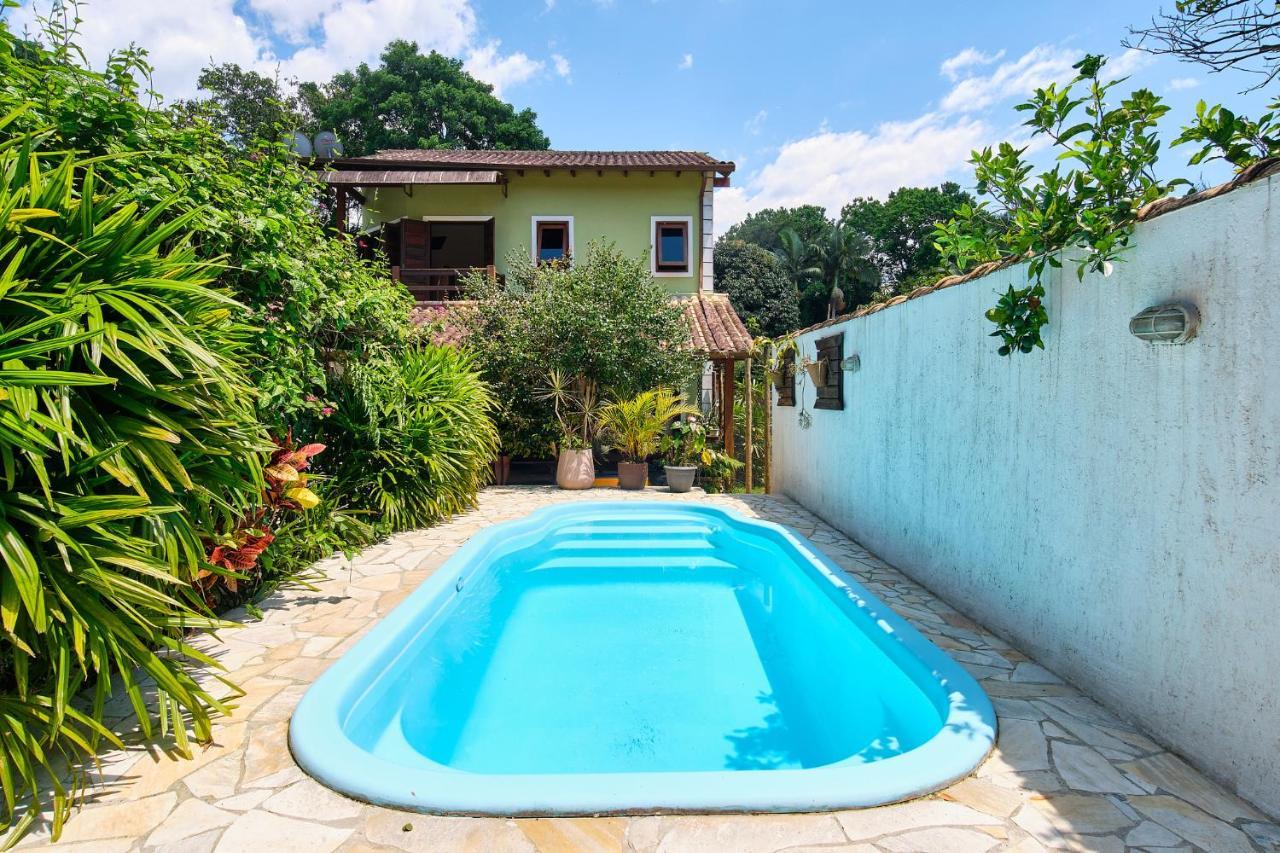 Casa Petúnia com ar e piscina perto do Centro Araquari Exterior foto