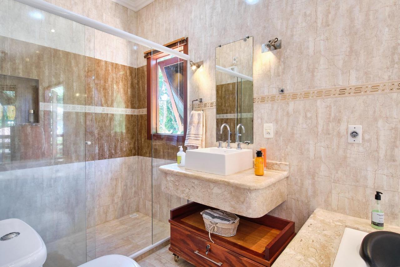 Casa Petúnia com ar e piscina perto do Centro Araquari Exterior foto