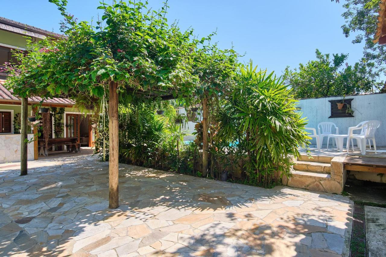 Casa Petúnia com ar e piscina perto do Centro Araquari Exterior foto