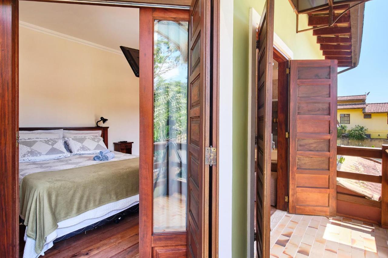 Casa Petúnia com ar e piscina perto do Centro Araquari Exterior foto